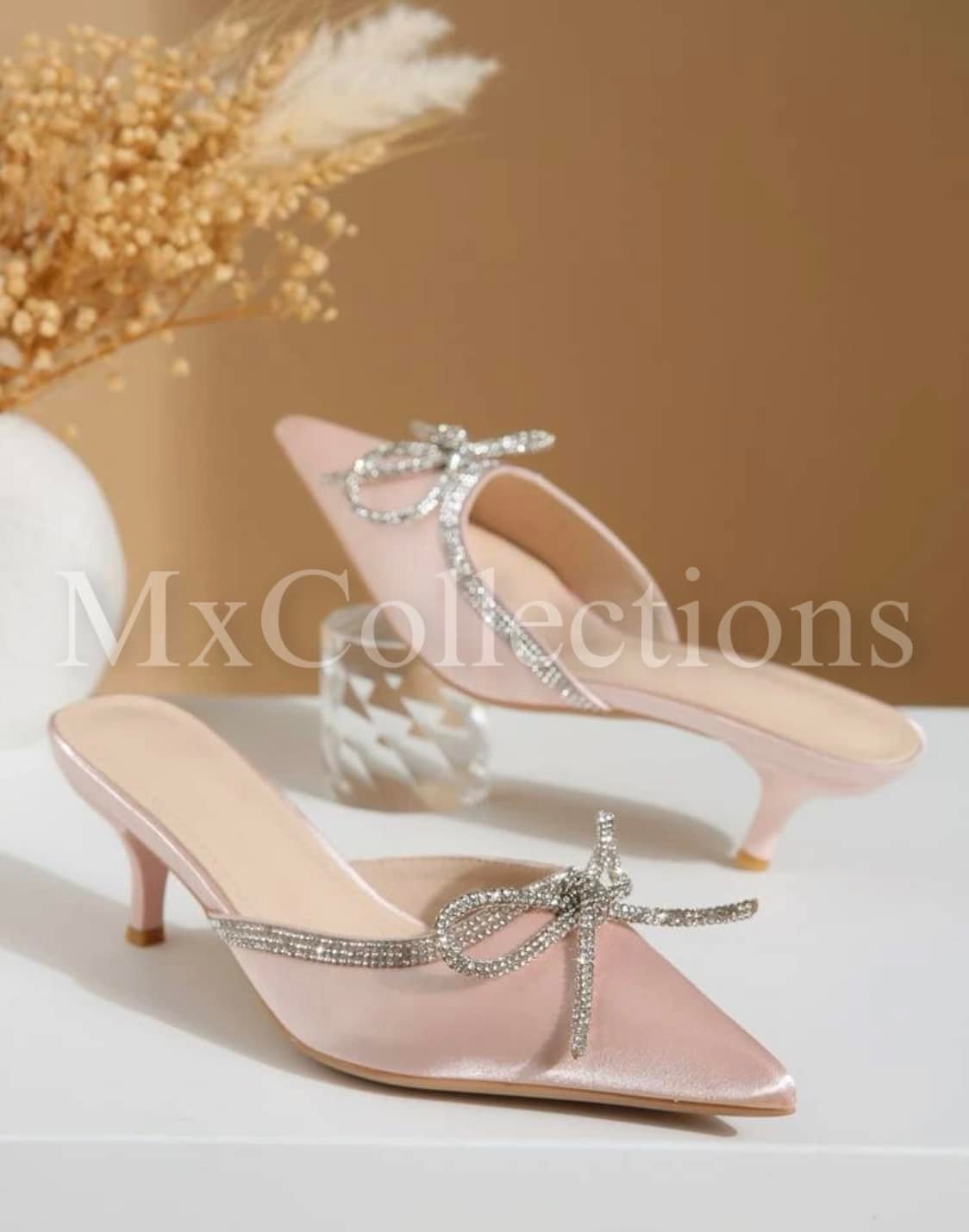 pink pointed pump