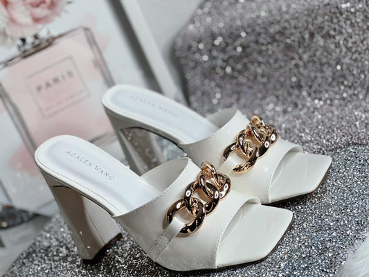 white chunky sandal heel with gold chain